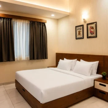 Luxury bedroom with elegant interiors at Golden Yug Indore